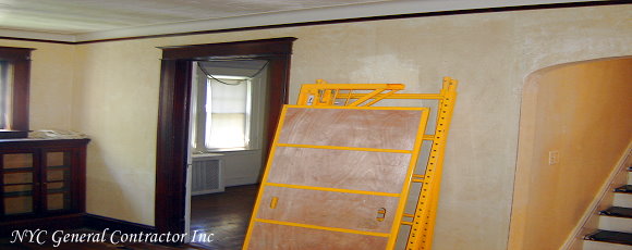 Begining of the Zarnitsky remodeling project - Setting up to make a wider opening entering the den area... General Contractor