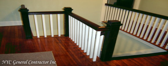 Top of the stairs on the second floor - Take notice how the spindles are freshly painted and how the refinished floor shines... General Contractor