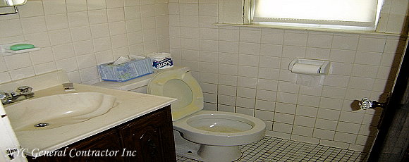 The same bathroom on the opposite side, just before we gutted it - In the next photo you'll see an amazing transformation... General Contractor